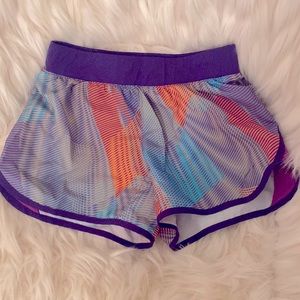 Nike girls running shorts. Lined, great for running. Yellow, teal and purple.